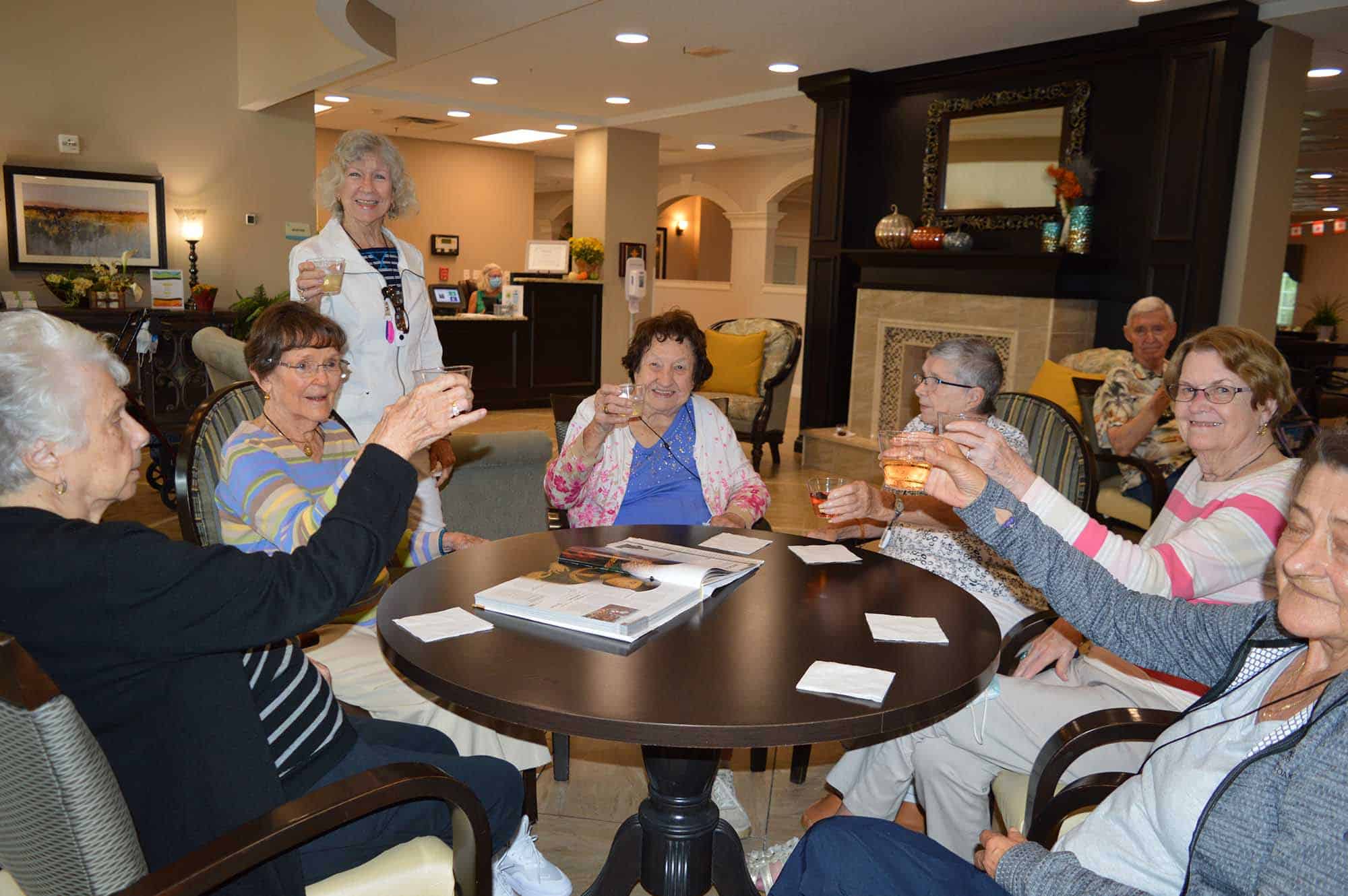 inspired living residents toasting