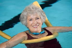 Senior woman enjoying the pool